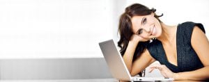 Woman with Beautiful Eyes Working on Laptop