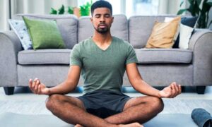 A man meditates to reduce stress and feel better